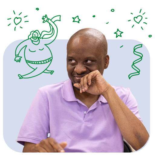 A man in a purple shirt smirking 