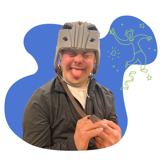 A man sticking his tongue out at the camera