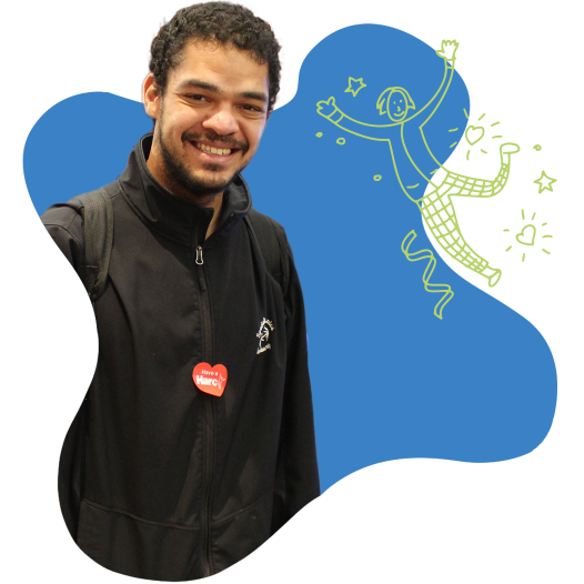 A man wearing a zip up sweater and a heart shaped HARC sticker